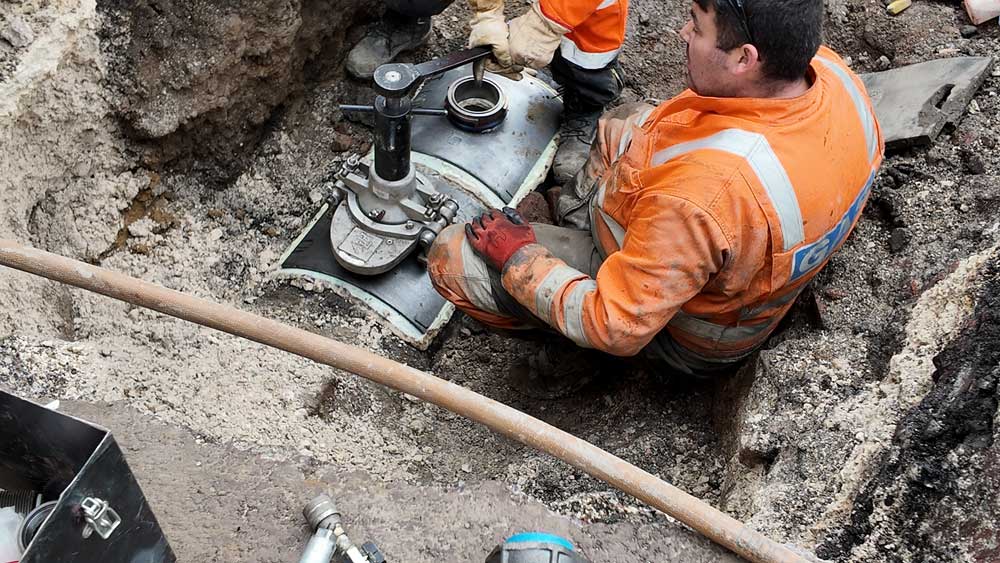man drilling gas main
